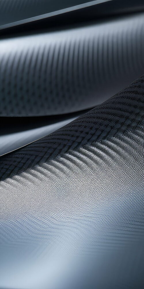 Close-up of carbon fiber composite material, representing the advanced focus of CICNDT in ultrasonic leak detection for ensuring high-quality composite manufacturing.