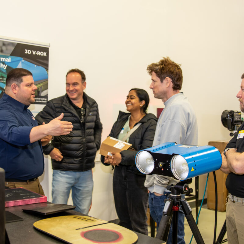 Non-contact photothermal tomography demonstration at the AIMM Center