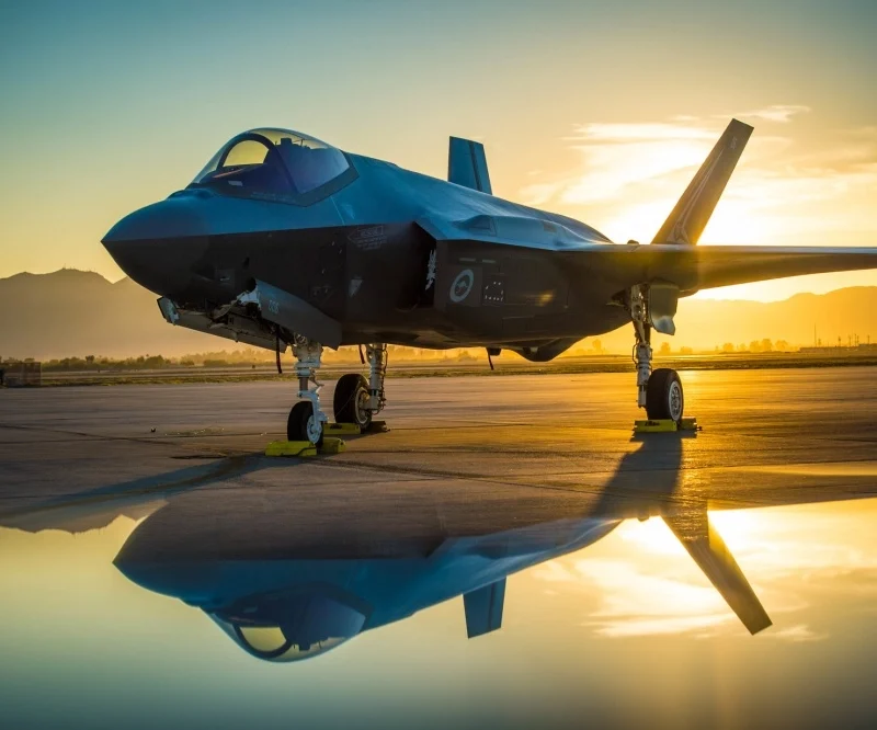 -35 fighter jet at sunrise representing Photothermal Radiometry in aerospace inspection