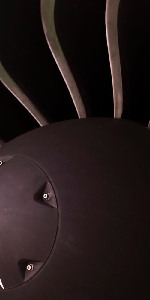 Close-up of jet engine turbine blades used in advanced composite inspection and NDT
