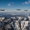 Three F-35A Lightning II fighters from Hill Air Force Base flying over snow-covered Utah mountains, illustrating CUI protection for F-35 program data